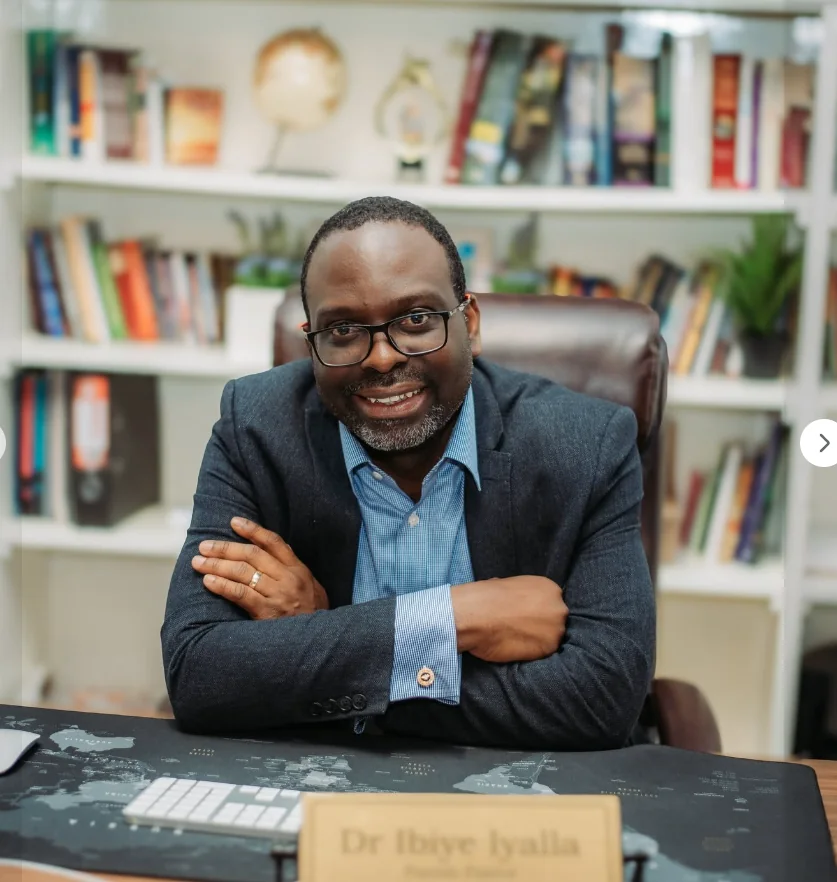 Pastor seated in his office